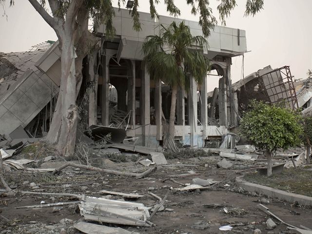 Kaddáfí, bombardovaná budova