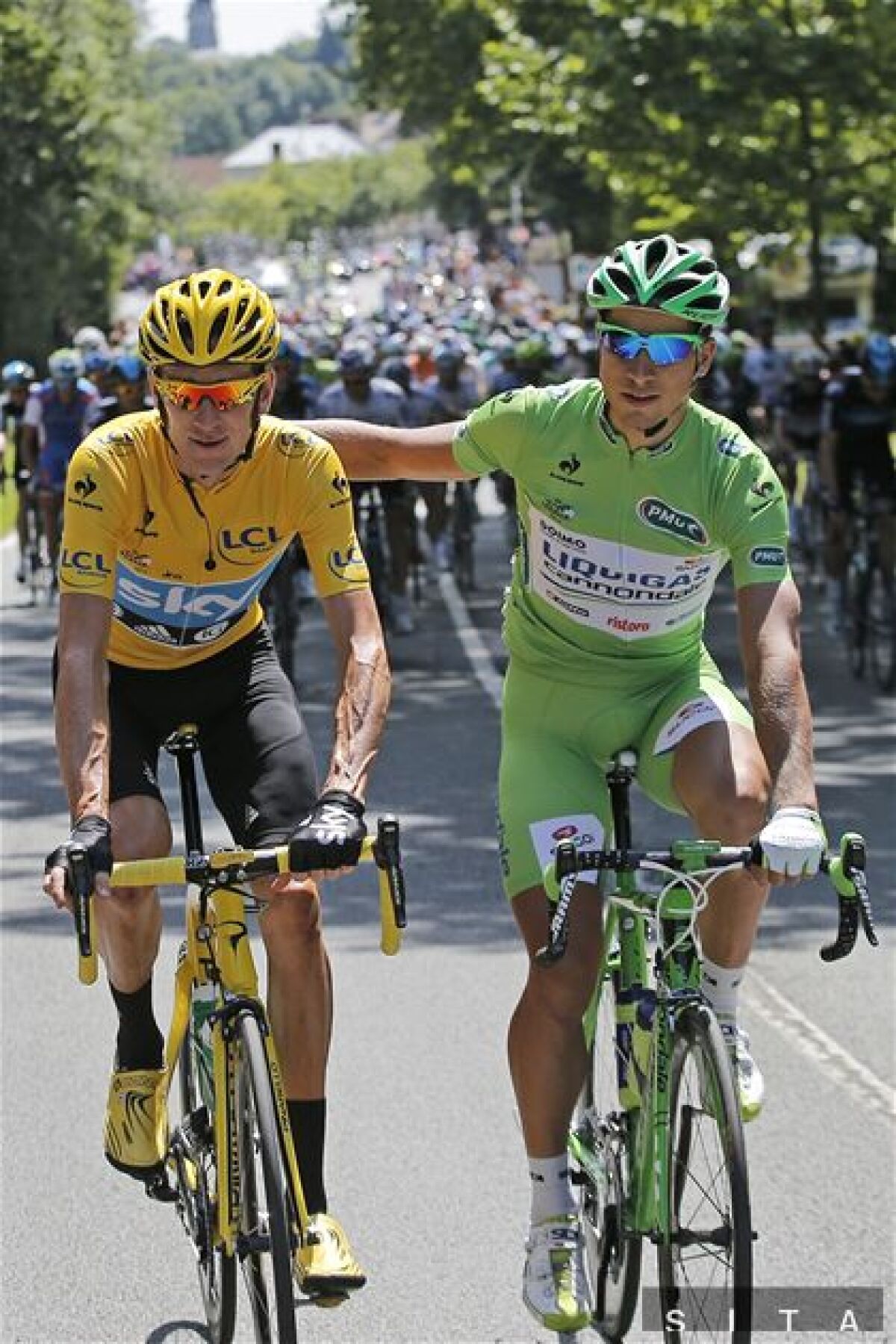 Peter Sagan a víťaz Tour Bradley Wiggins