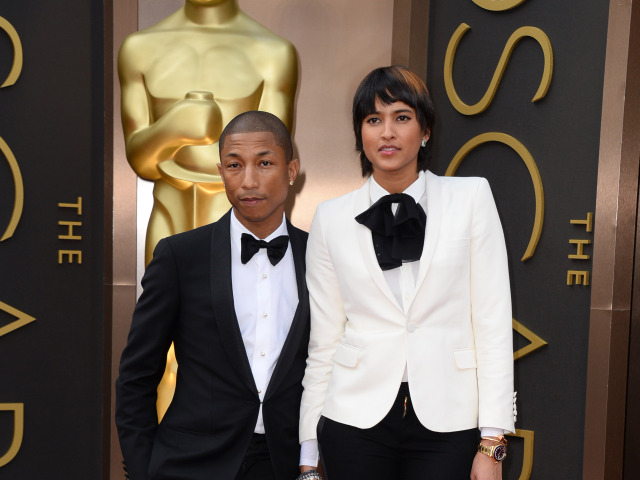 Pharrell Williams a jeho manželka Helen Lasichanh.