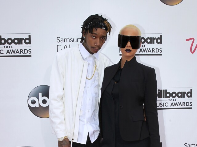 Raper Wiz Khalifa a jeho manželka - modelka Amber Rose.