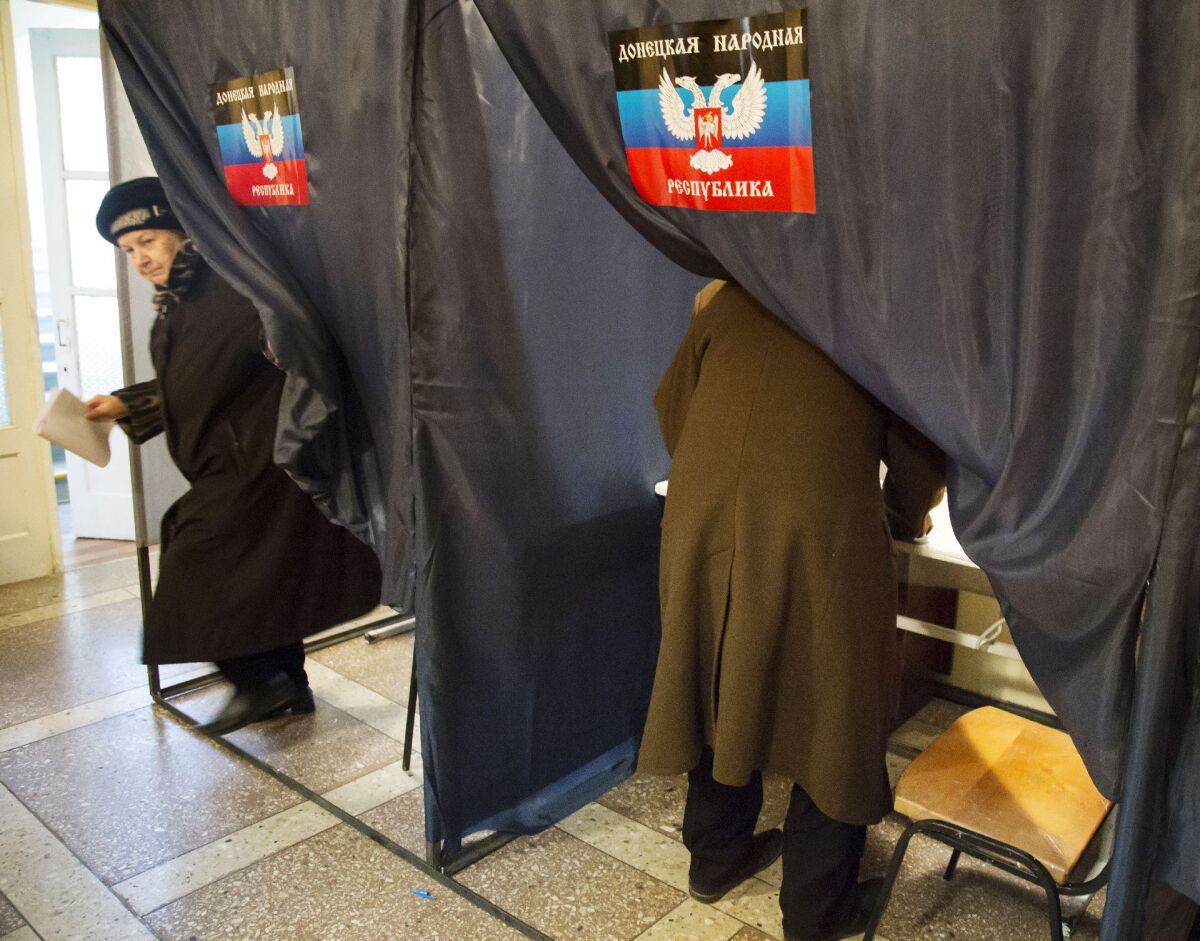 Ukrajina, voľby, Donbas, Doneck, Luhansk, vojaci, urny, proruskí separatisti
