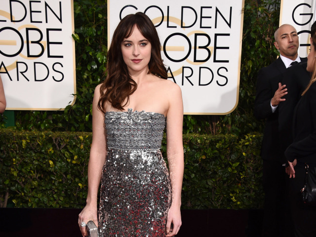 72nd Annual Golden Globe Herečka Dakota Johnson v modeli Chanel Couture. - Arrivals