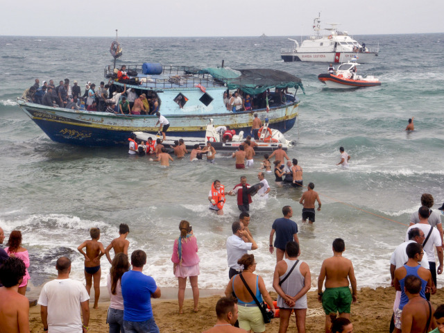 Migranti, Taliansko