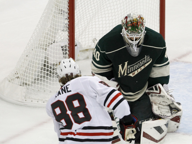 Patrick Kane, Devan Dubnyk