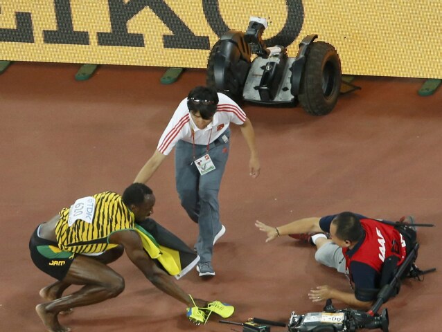 usain bolt, kolízia, kameraman, segway