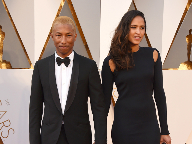 Hudobník Pharrell Williams a jeho manželka Helen Lasichanh.
