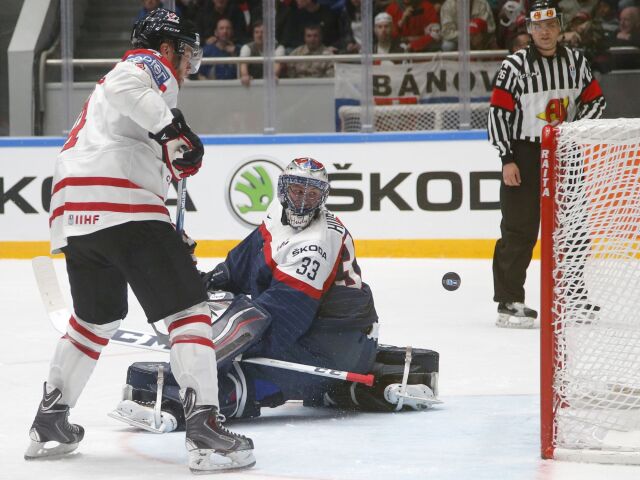 Taylor Hall, Július Hudáček
