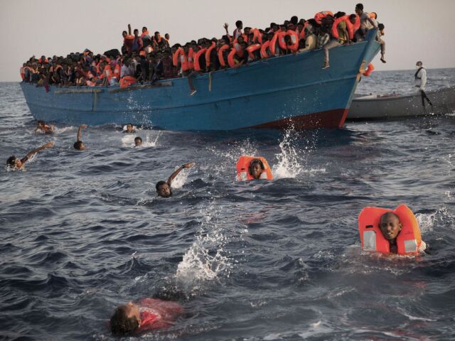 migranti, čln