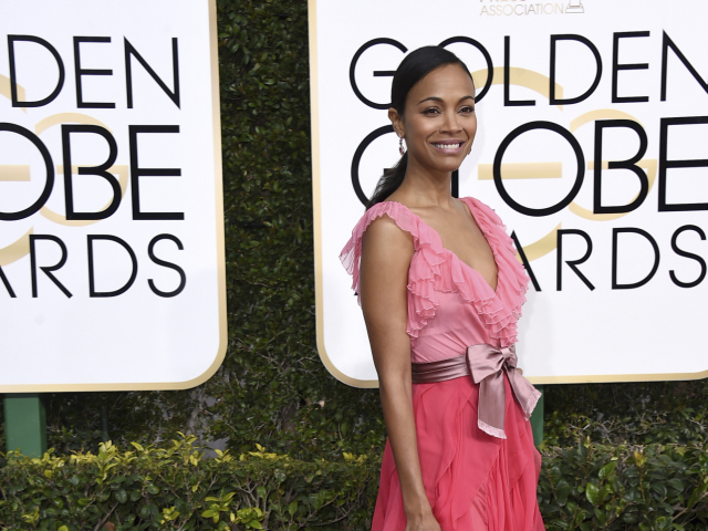 Herečka Zoe Saldana v šatách Gucci Premiere.
