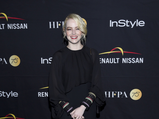 Herečka Emma Stone prišla na akciu v šatách Chloe.