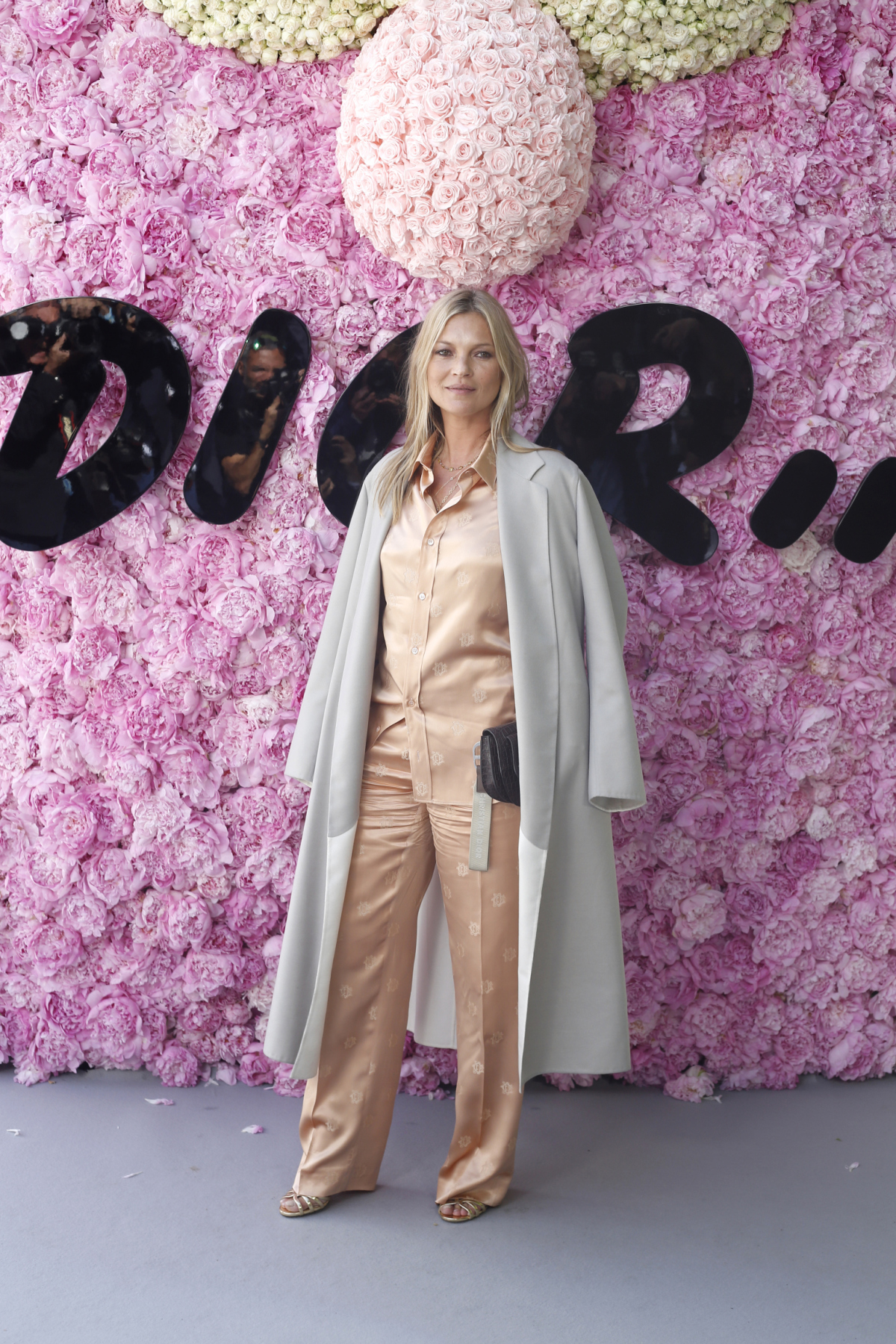 Modelka Kate Moss pózuje spoločne pred prehliadkou pánskej kolekcie Dior Jar-Leto 2019.