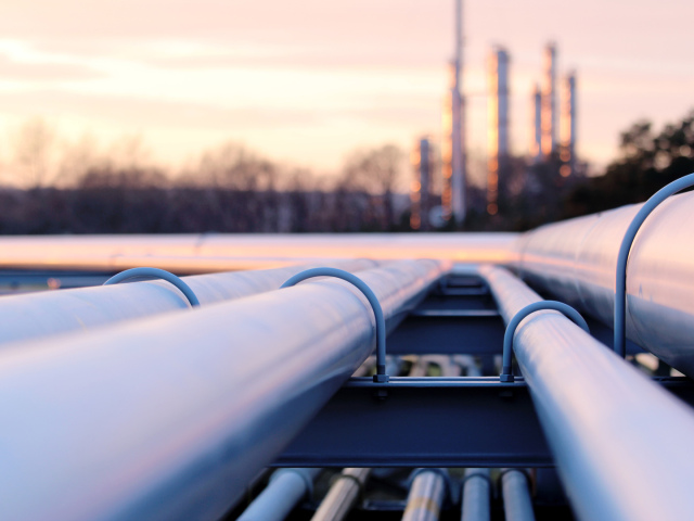 DN - Steel Long Pipes In Crude Oil Factory During Sunset
