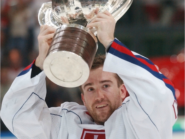 Hokej.