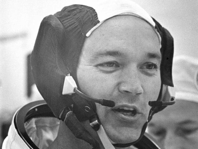 APOLLO 11 COMMAND MODULE PILOT COLLINS, MICHAEL IN SPACE SUIT.