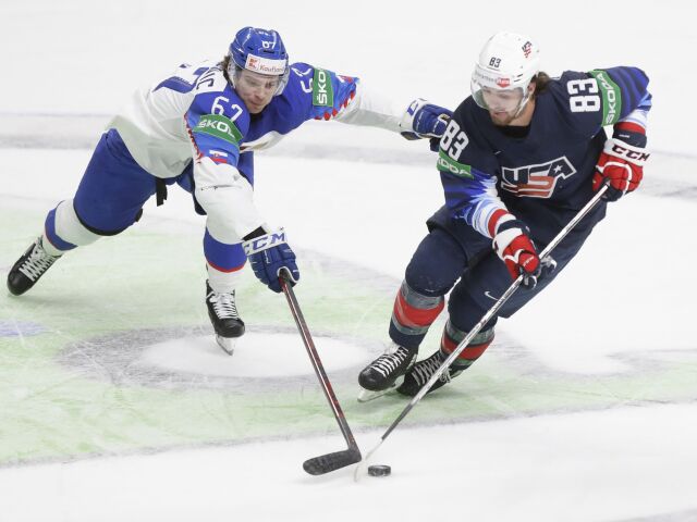 Marián Studenič, Conor Garland
