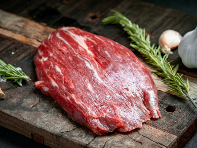 Raw flank beef steak,