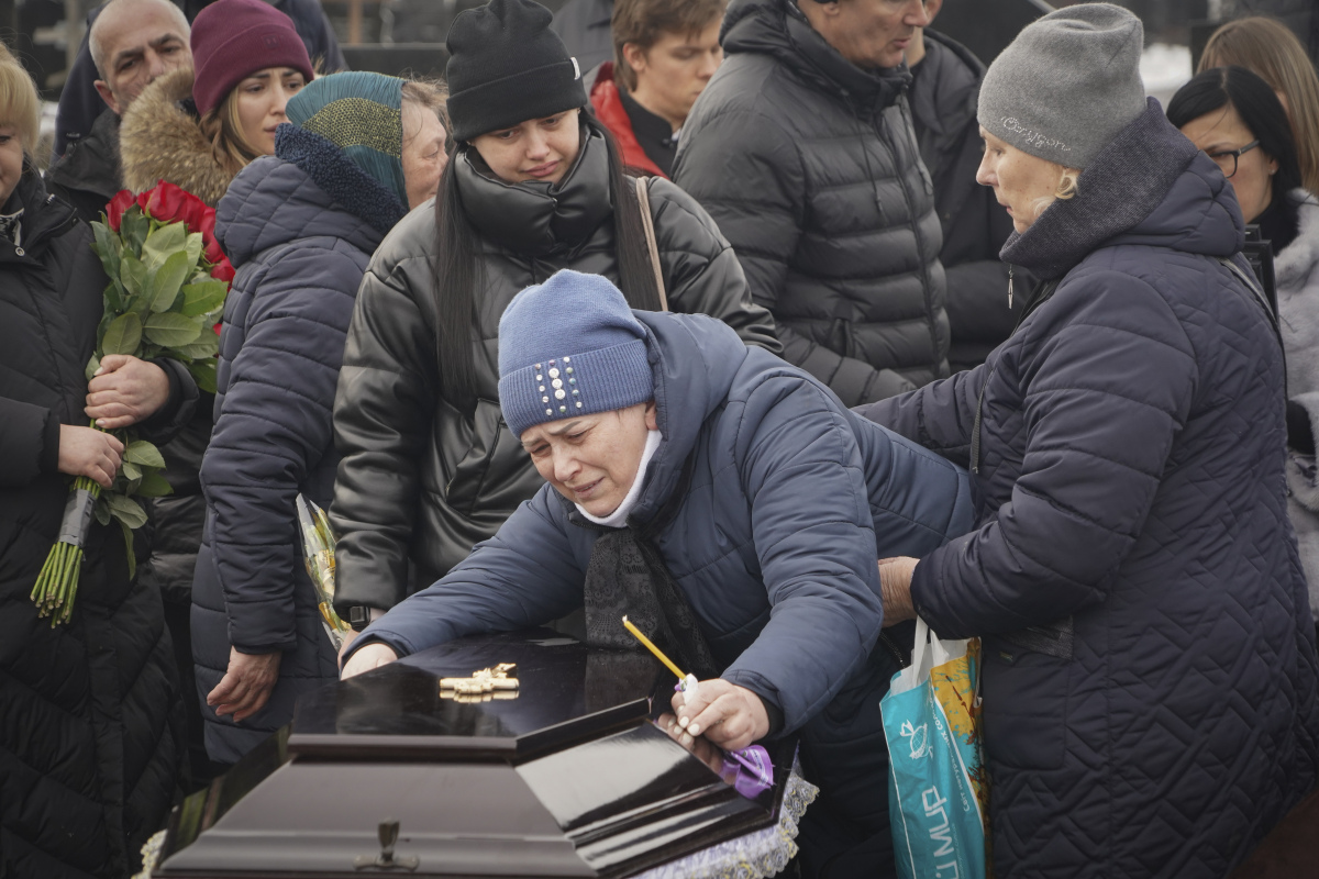 Russia Ukraine War pohreb rodiny po útoku ruským dronom