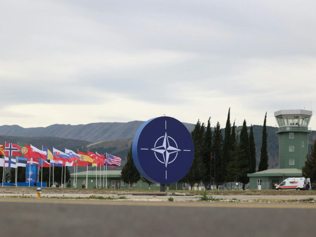 Kucova airbase NATO sign
