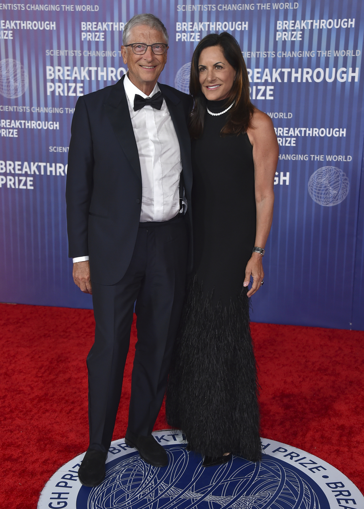 Bill Gates a jeho partnerka Paula Hurd