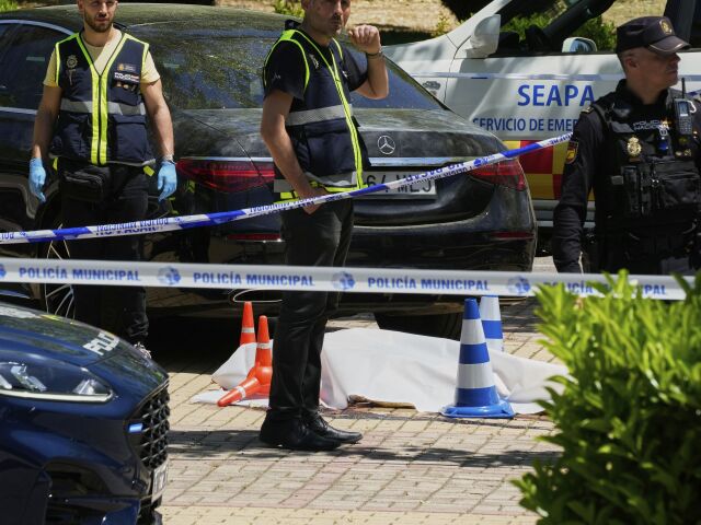 CORRECTION Spain Ukraine Shooting