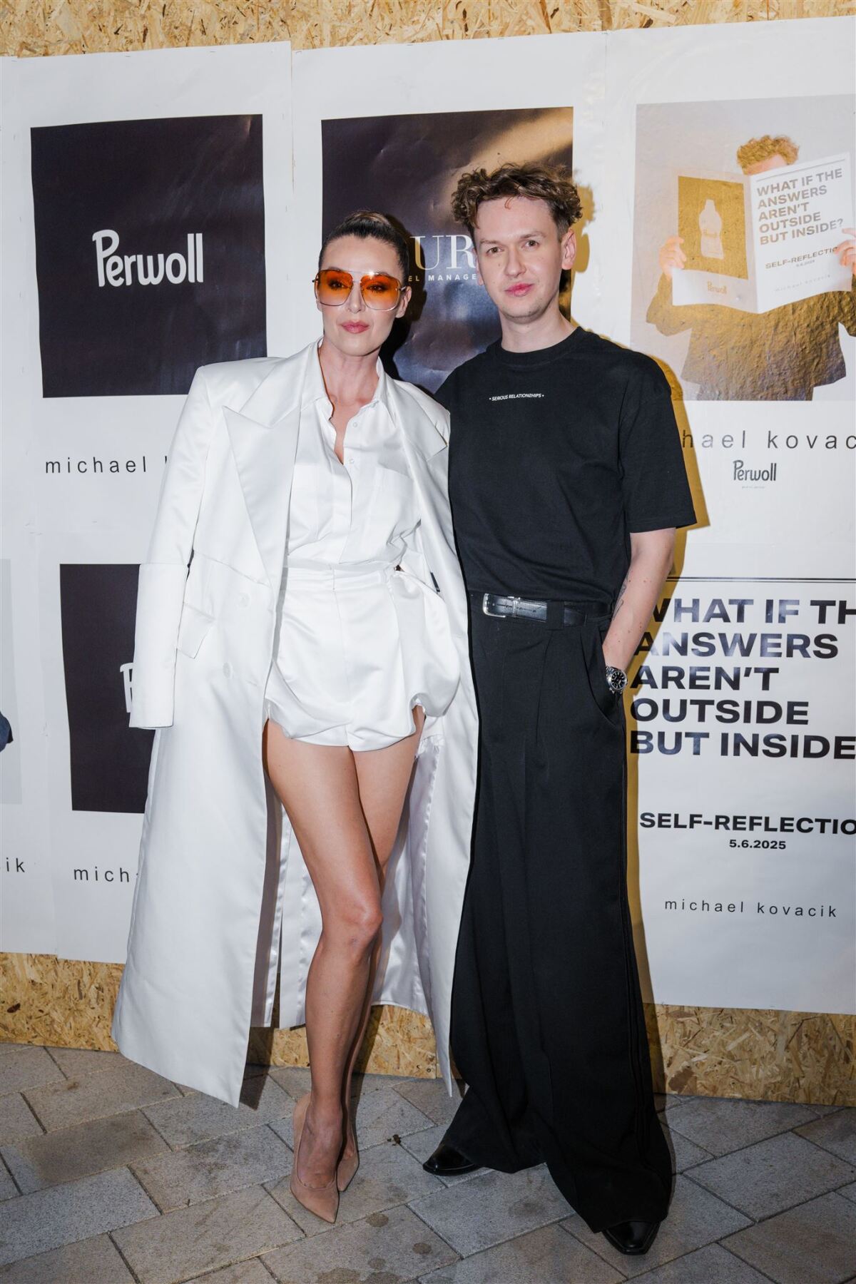 Dizajnér Michael Kováčik a česká modelka a moderátorka Iva Kubelková. 