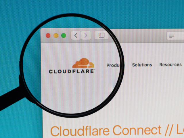 Cloudflare logo under magnifying glass